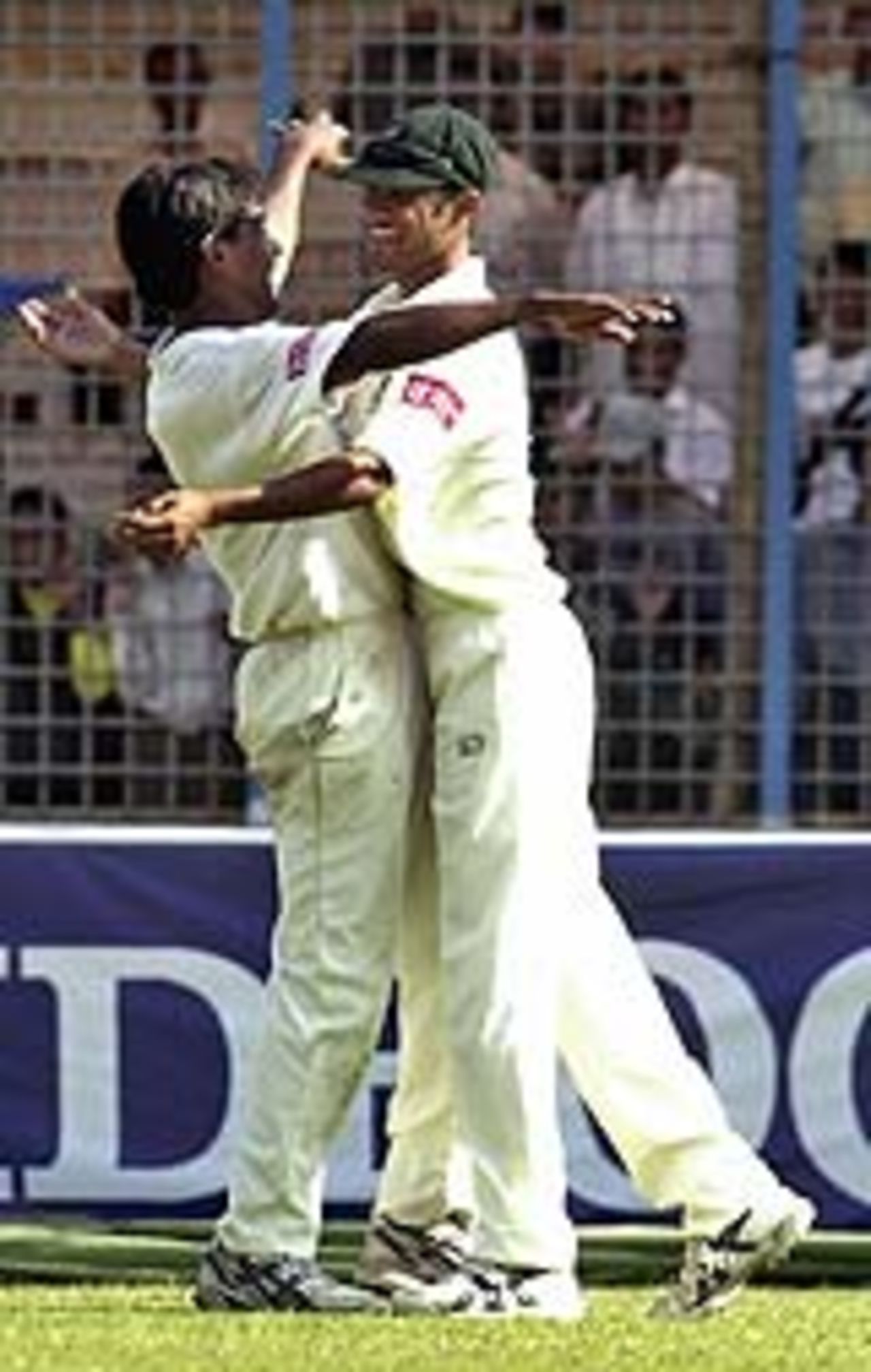 Mohammad Rafique celebrates the dismissal of Harbhajan Singh, Bangladesh v India, 2nd Test, Chittagong, 2nd day, December 18, 2004