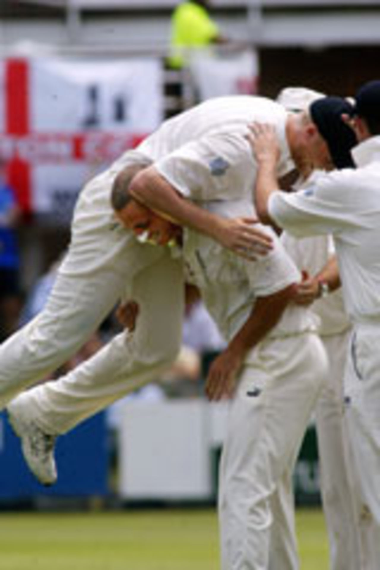 Simon Jones lifts Andrew Flintoff, South Africa v England, 2nd day, 1st Test, Port Elizabeth, December 18 2004