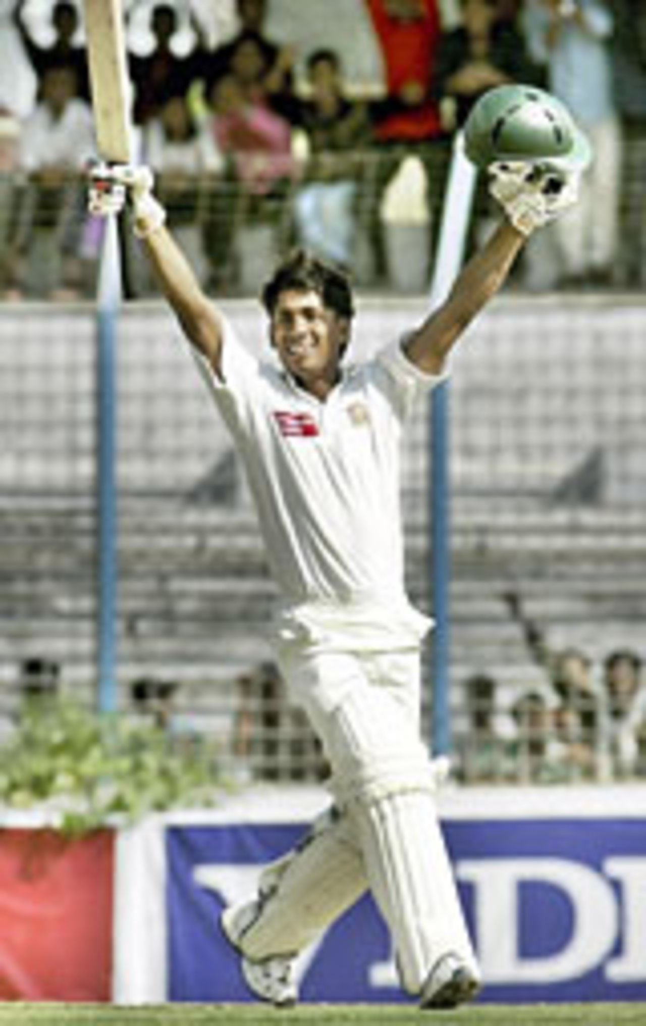 Mohammad Ashraful raises his bat, Bangladesh v India, 2nd Test, Chittagong, 3rd day, December 19 2004