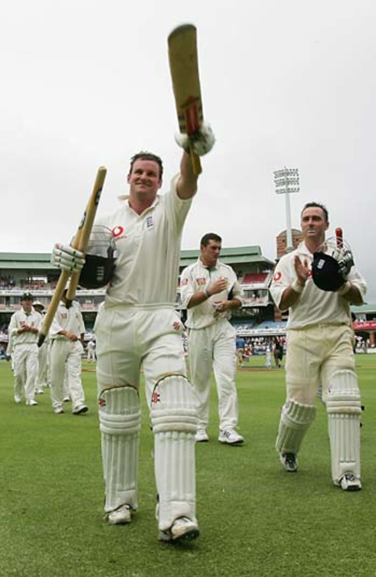 Andrew Strauss leads England off after their seven-wicket win, South Africa v England, 1st Test, Port Elizabeth, December 21 2004