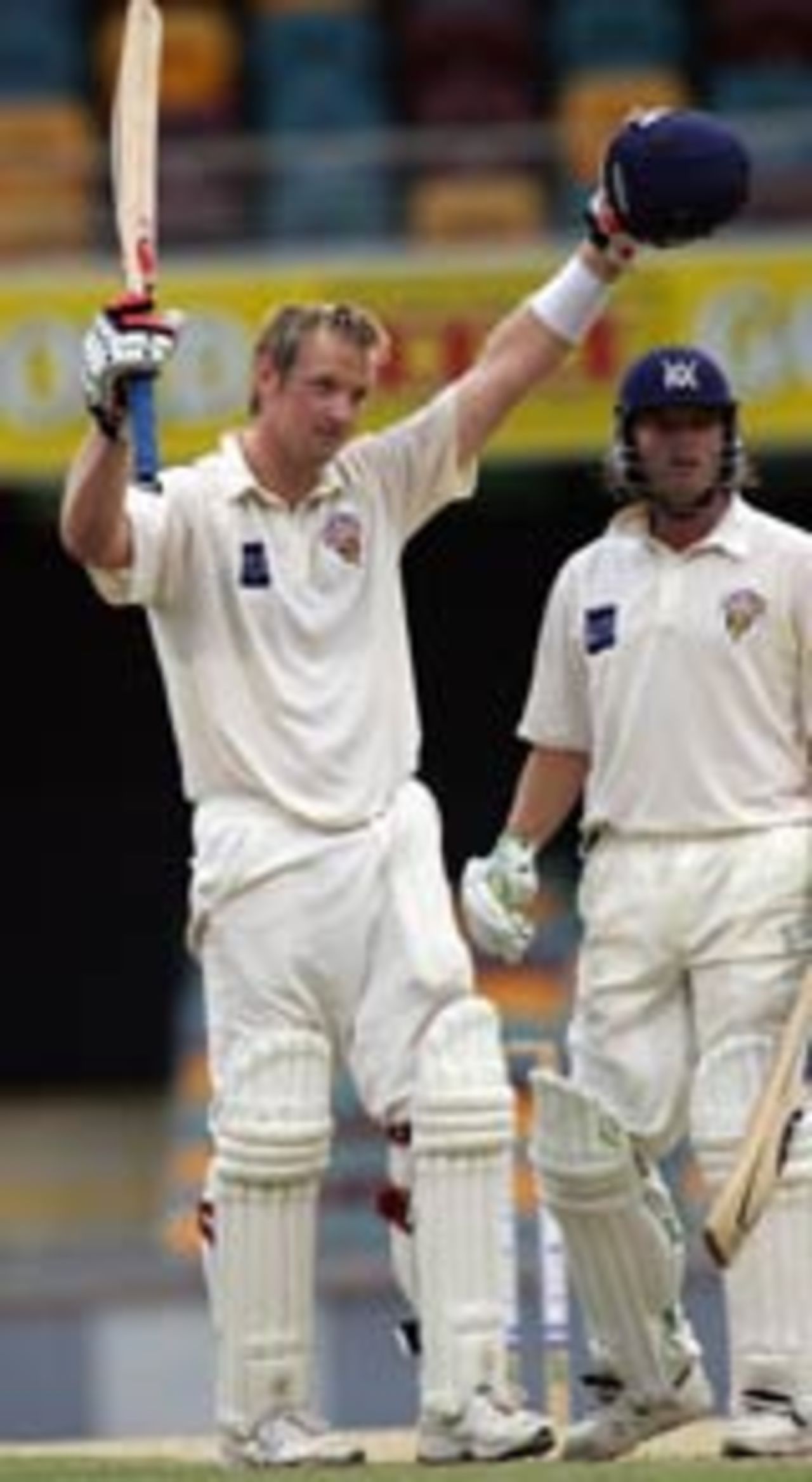 Cameron White acknowledges his maiden first-class hundred, Victoria v Queensland, Brisbane, December 21, 2004