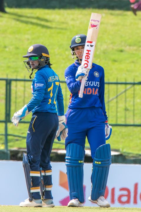 Smriti Mandhana raises her bat after getting to fifty, Sri Lanka vs India, 2nd women's ODI, Pallekele, July 4, 2022
