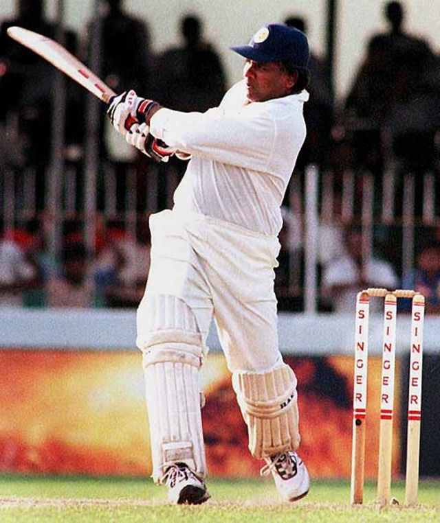 Arjuna Ranatunga pulls the ball as wicket keeper Mark Boucher looks on during the final cricket test between Sri Lanka and South Africa in Colombo. South Africa in Sri Lanka, 2000/01, 3rd Test, Sri Lanka v South Africa, Sinhalese Sports Club Ground, Colombo, 06-10 August 2000 (Day 5).