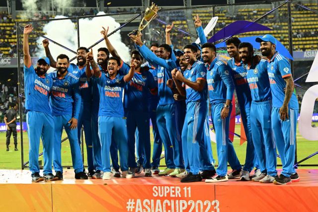Job done, it's time to celebrate - India with their eighth Asia Cup trophy