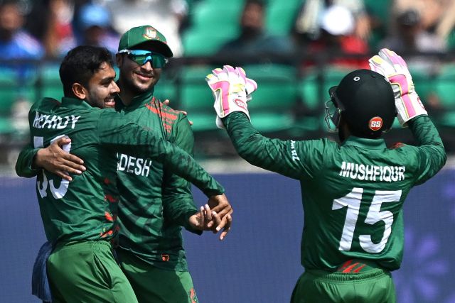 Mehidy Hasan Miraz celebrates with Shakib Al Hasan and Mushfiqur Rahim