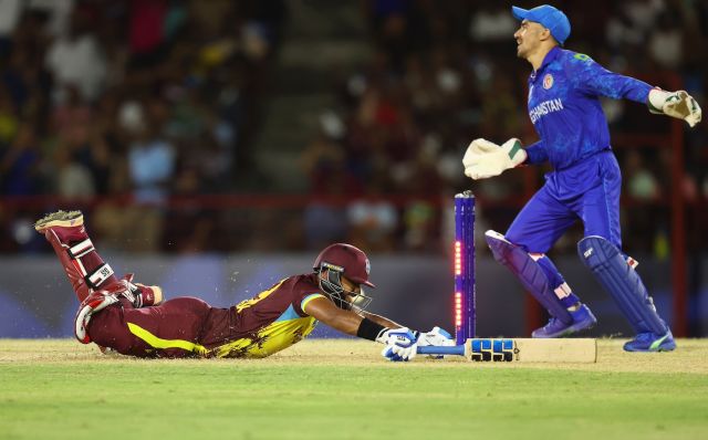 Rahmanullah Gurbaz celebrates after Nicholas Pooran falls short, West Indies vs Afghanistan, T20 World Cup, St Lucia, June 17, 2024