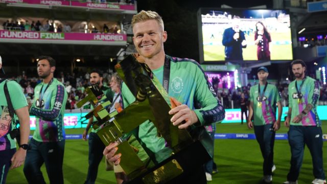 Sam Billings lifts the trophy after Oval Invincibles' third Men's Hundred title.