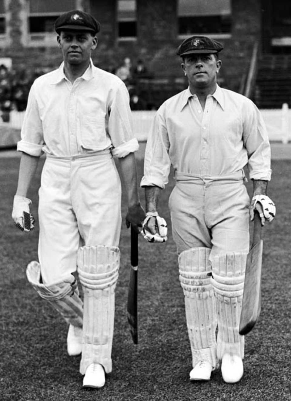 Bill Woodfull walks out to bat with Charles Macartney