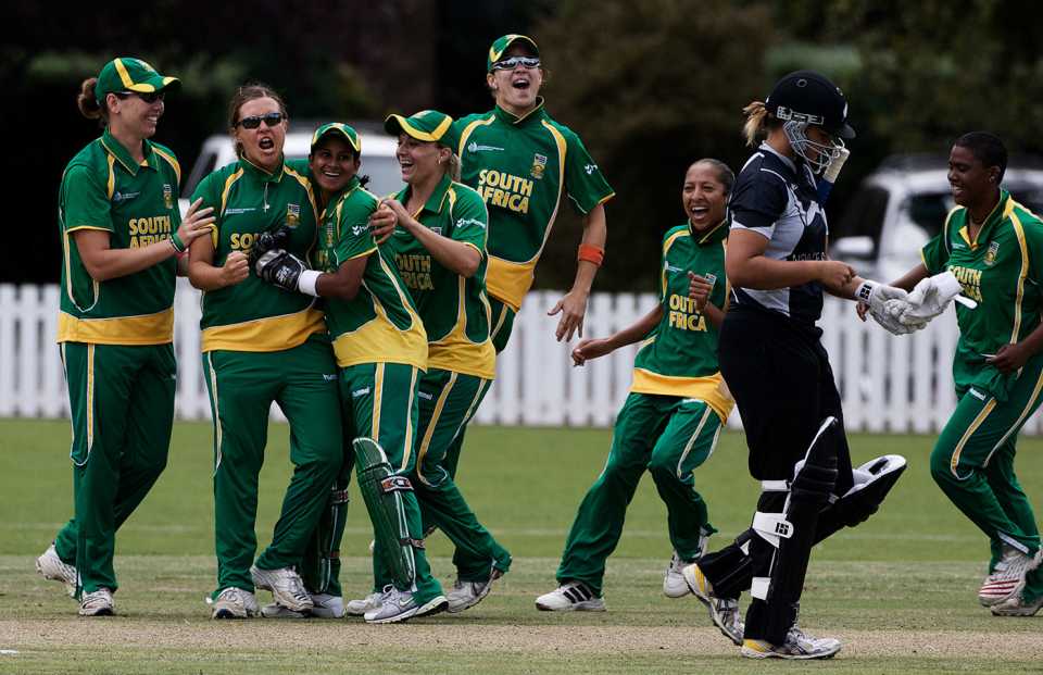 Charlize van der Westhuizen is congratulated for the wicket of Suzie Bates