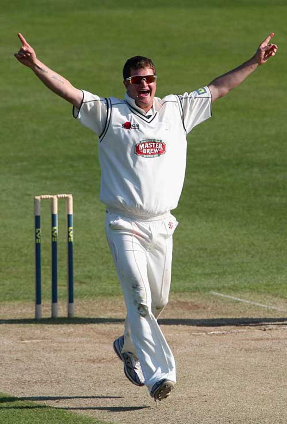 Robert Key celebrates his maiden first-class wicket
