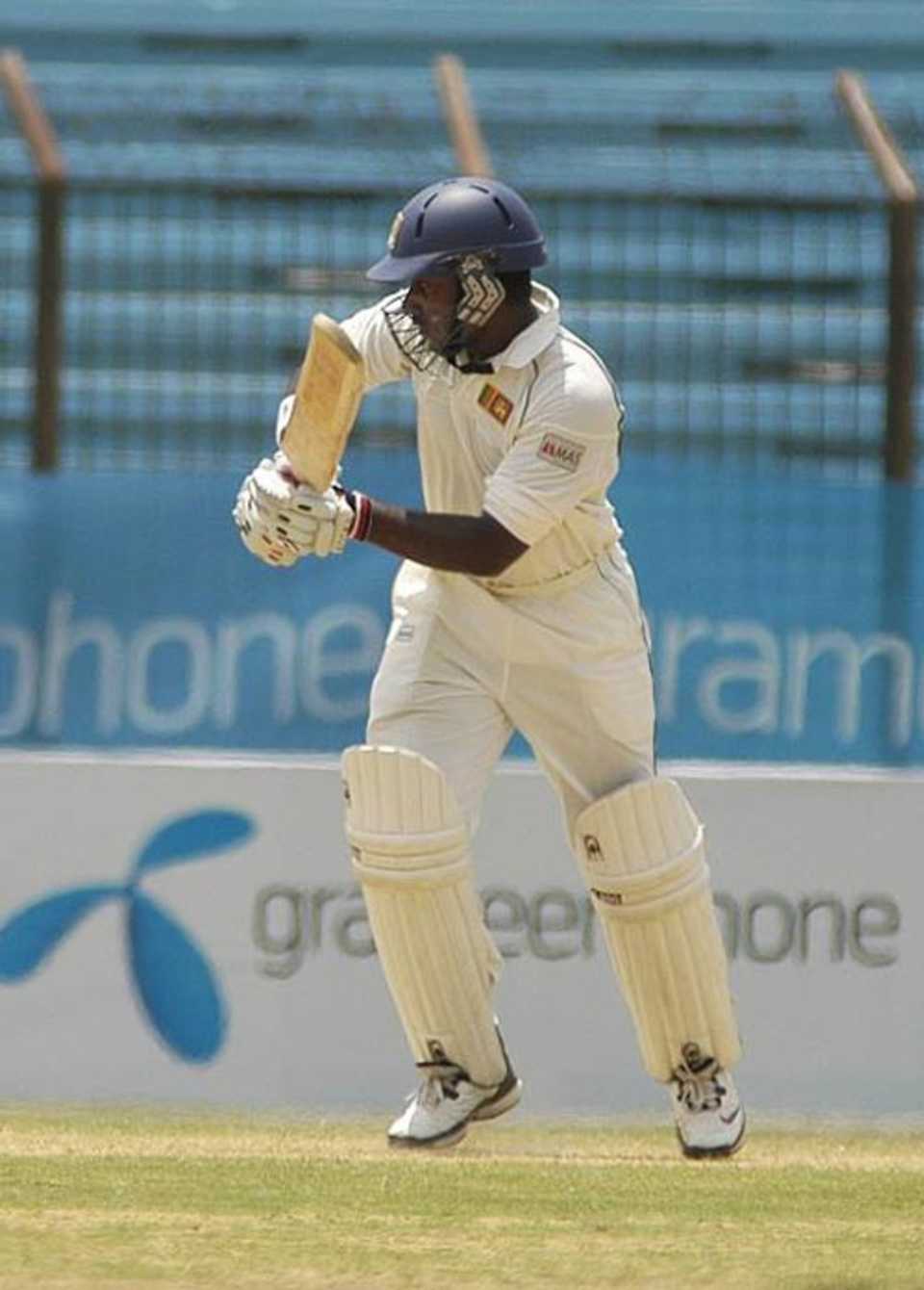 Mahela Udawatte works one away during his century
