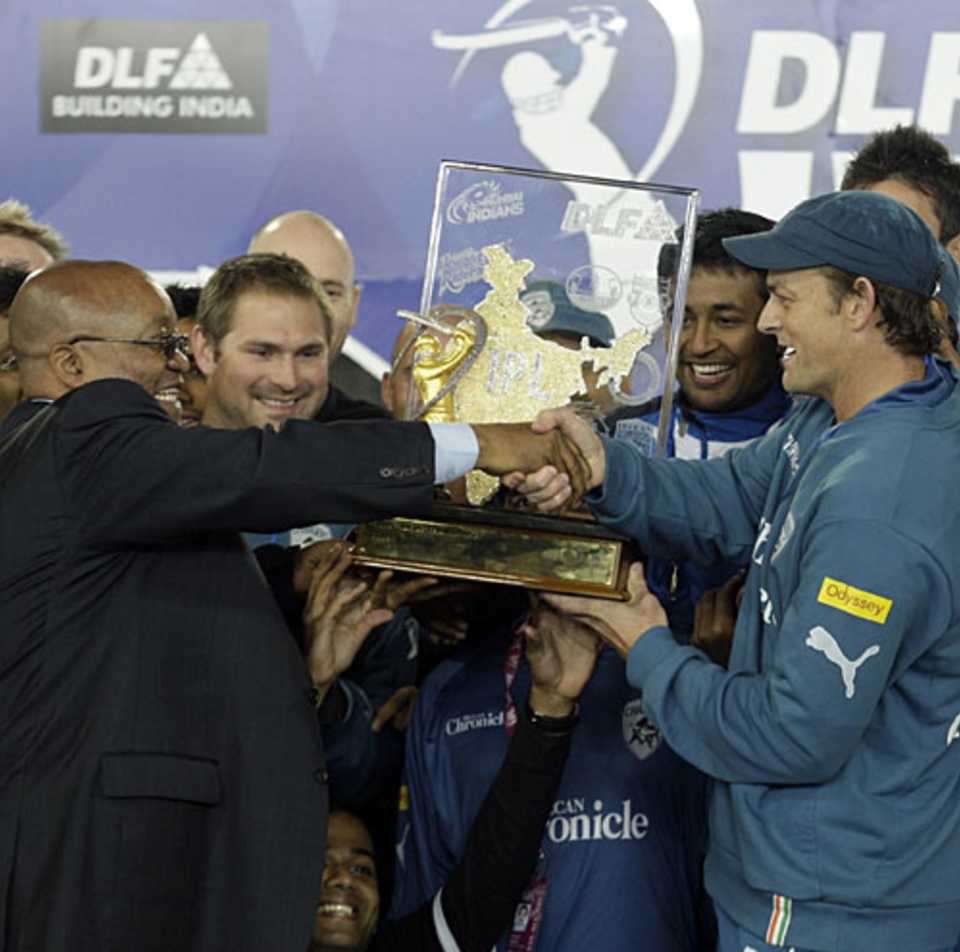 South African president Jacob Zuma hands the Deccan Chargers the IPL trophy