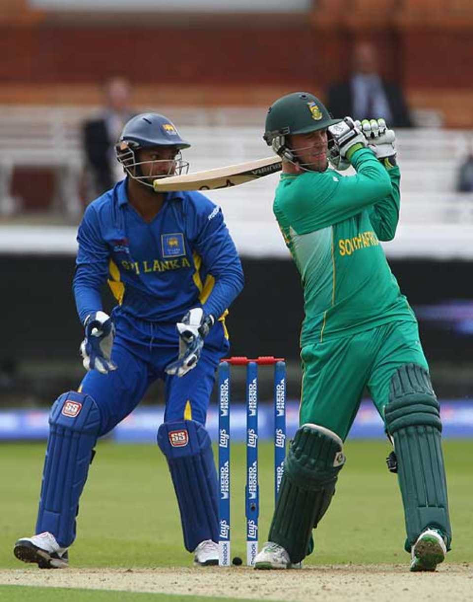 AB de Villiers clouts the ball away to the leg side