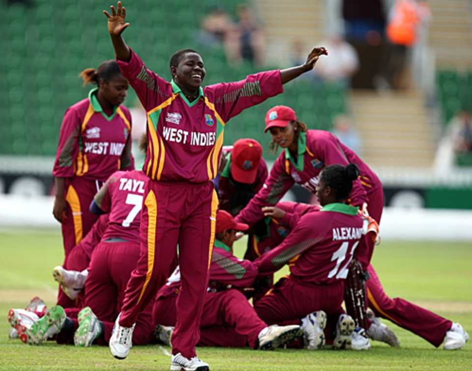 The West Indies players celebrate the victory