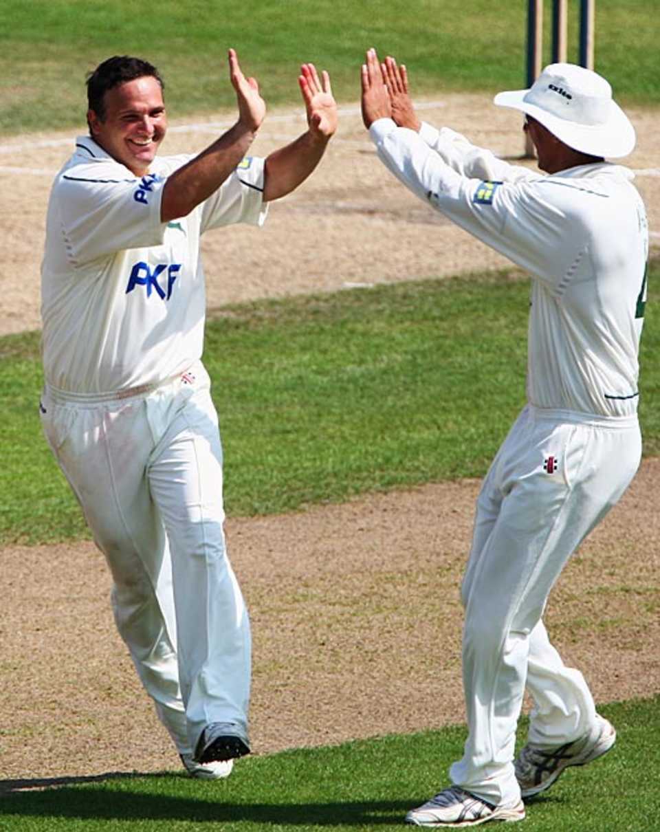 Mark Ealham celebrates a wicket