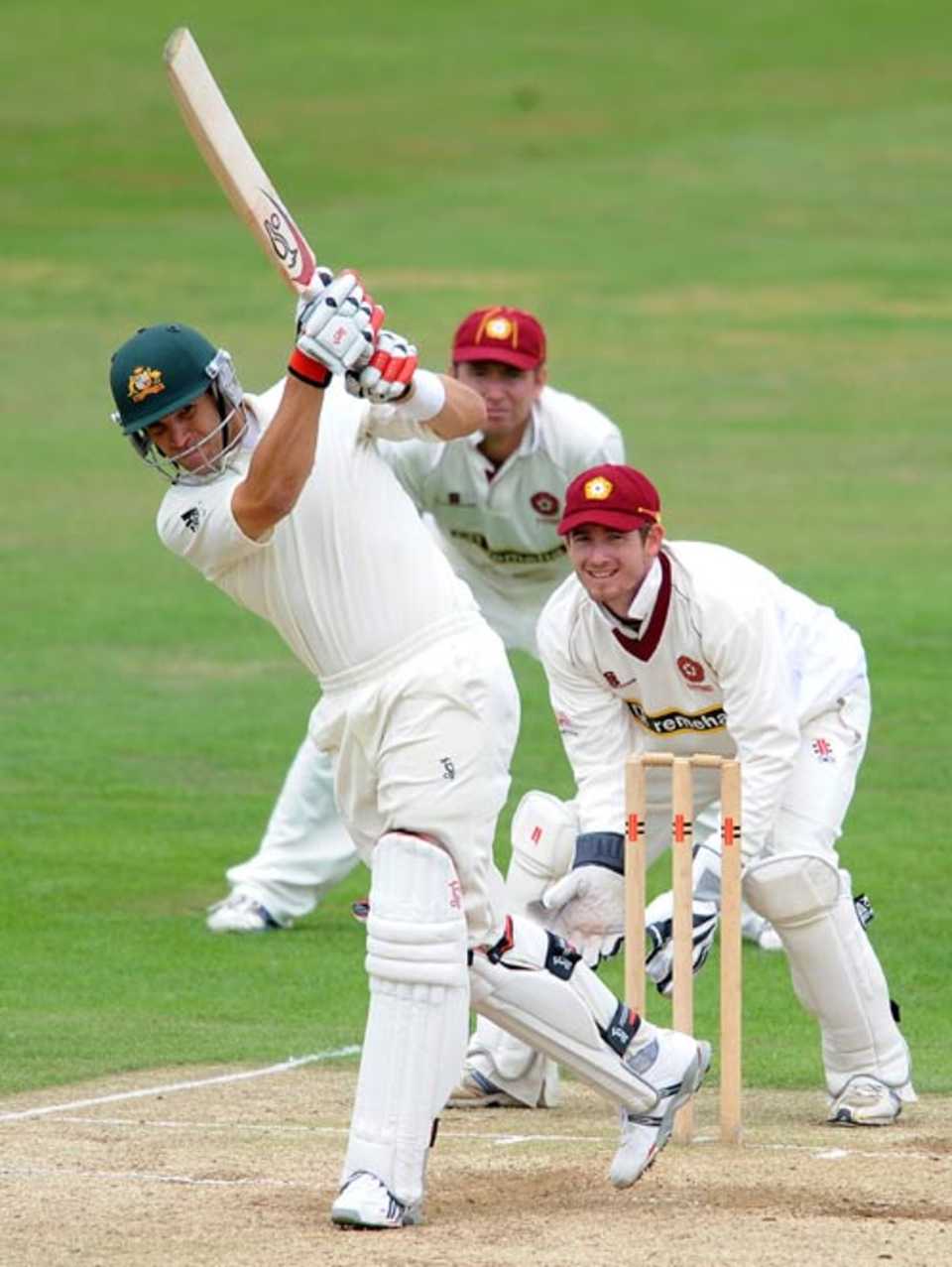 Graham Manou drives through the on-side on his way to a half-century