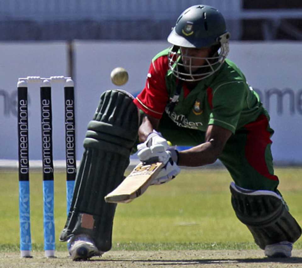 Shakib Al Hasan scoops the ball behind the wicket
