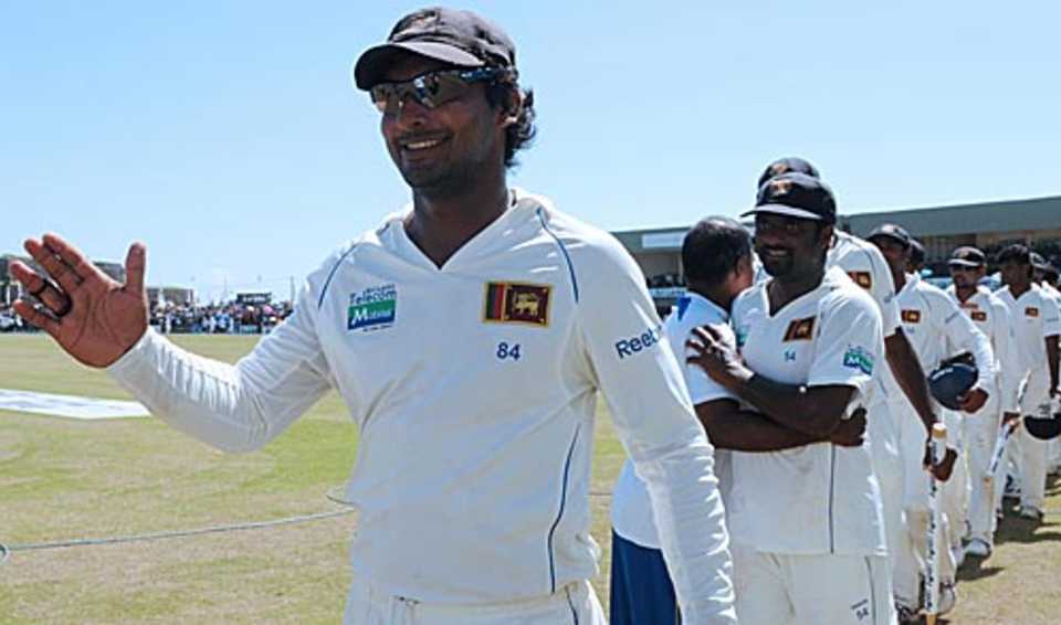 Kumar Sangakkara is all smiles as he leads his victorious team off the field, Sri Lanka v New Zealand, 1st Test, Galle, 5th day, August 22, 2009 