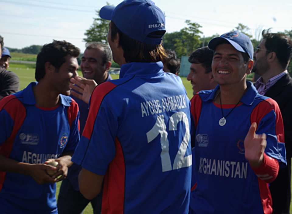 Ayoub Ahmadzai is congratulated after being named the Man of the Match