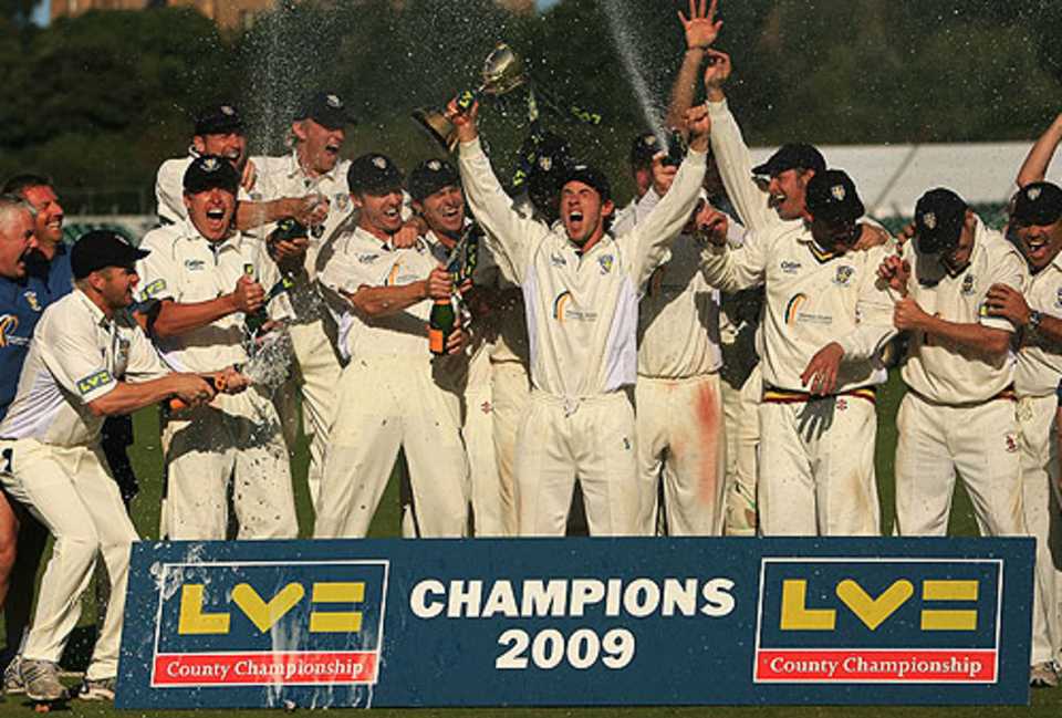 Durham celebrate the retention of their County Championship title as Will Smith lifts the trophy
