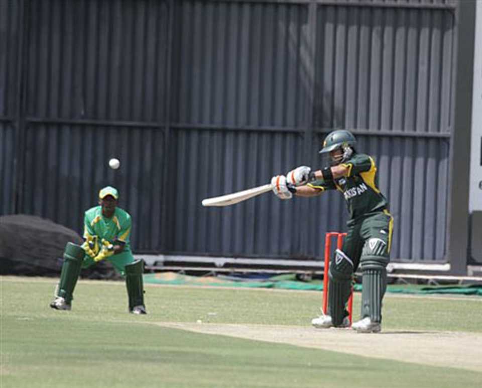 A Pakistan Under-19 player cuts the ball