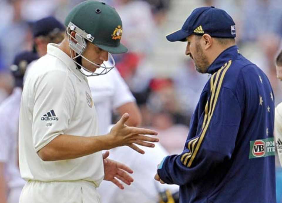 Graham Manou checks out his injured hand with the team physio Alex Kountouris, England v Australia, 3rd Test, Edgbaston, 5th day, August 3, 2009