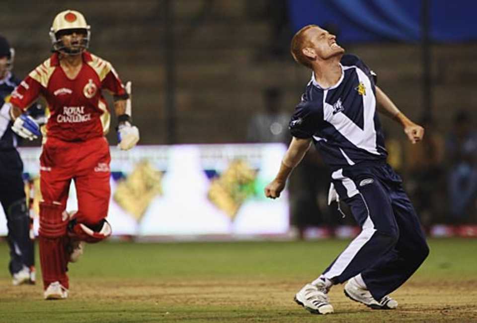 Andrew McDonald celebrates Rahul Dravid's wicket