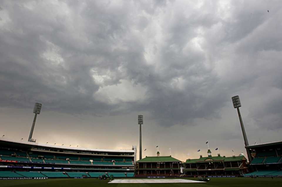Play is suspended as a storm passes over the SCG