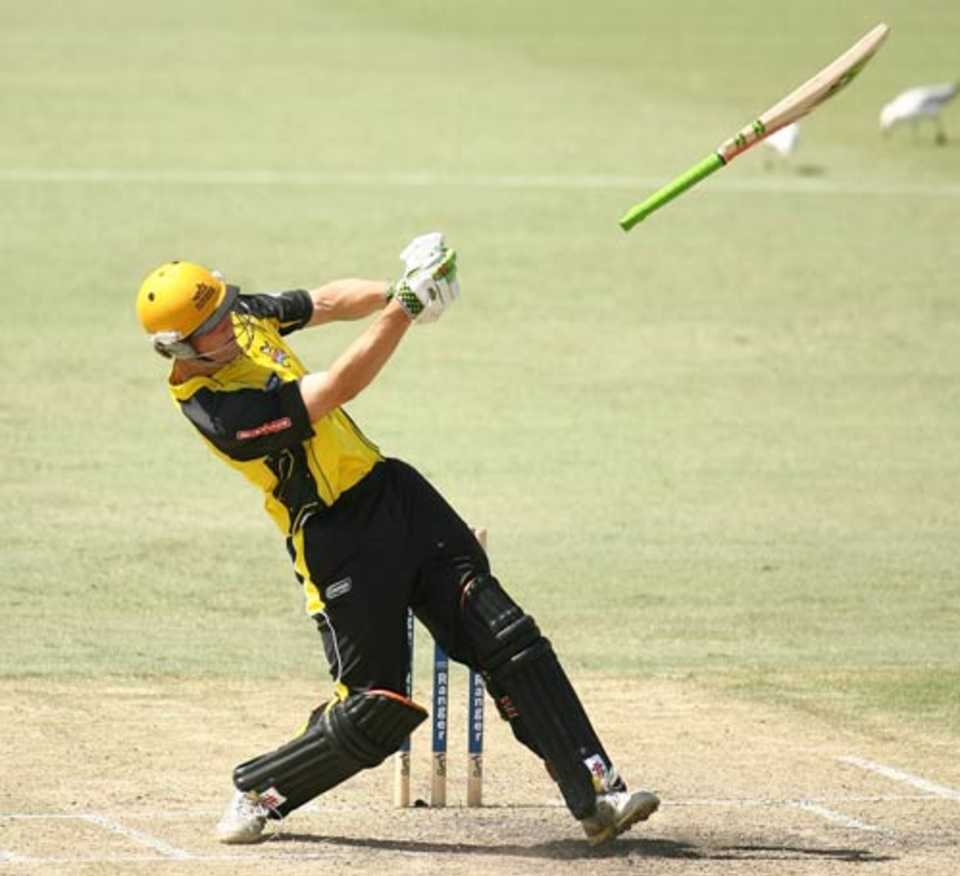 Mitchell Marsh lets his bat go trying for a midwicket slog