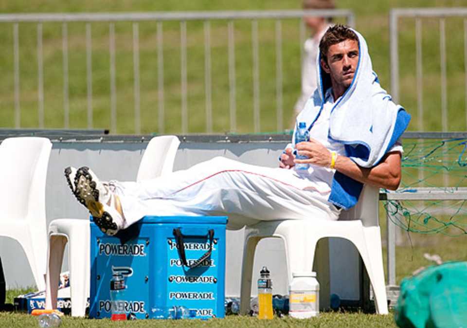 England's 12th man, Liam Plunkett, cools off on the boundary's edge, South African Invitational XI v England XI at East London, December 12, 2009 