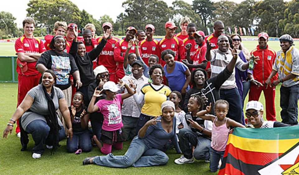 The Zimbabwe Under-19 players pose with their fans, New Zealand Under-19s v Zimbabwe Under-19s, 19th Match, Group C, ICC Under-19 World Cup, Lincoln, January 19, 2010