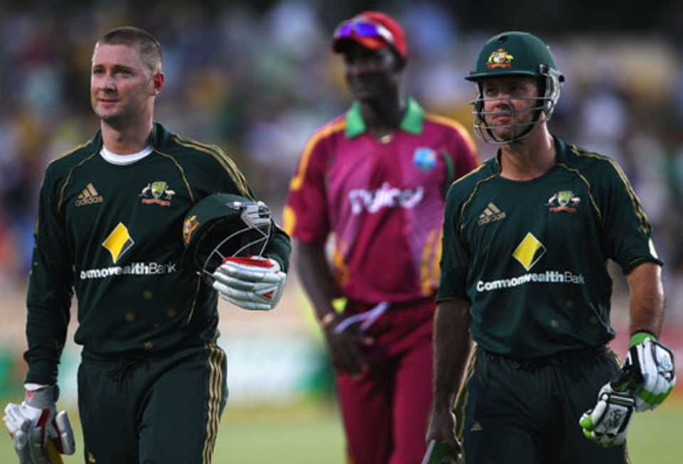 Michael Clarke and Ricky Ponting walk off after sealing the win