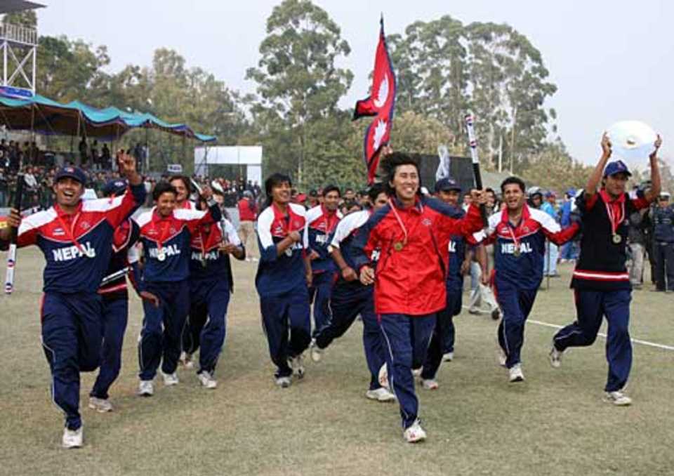 Nepal do a lap of honour after victory over USA