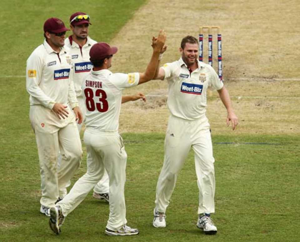 Chris Swan celebrates a wicket