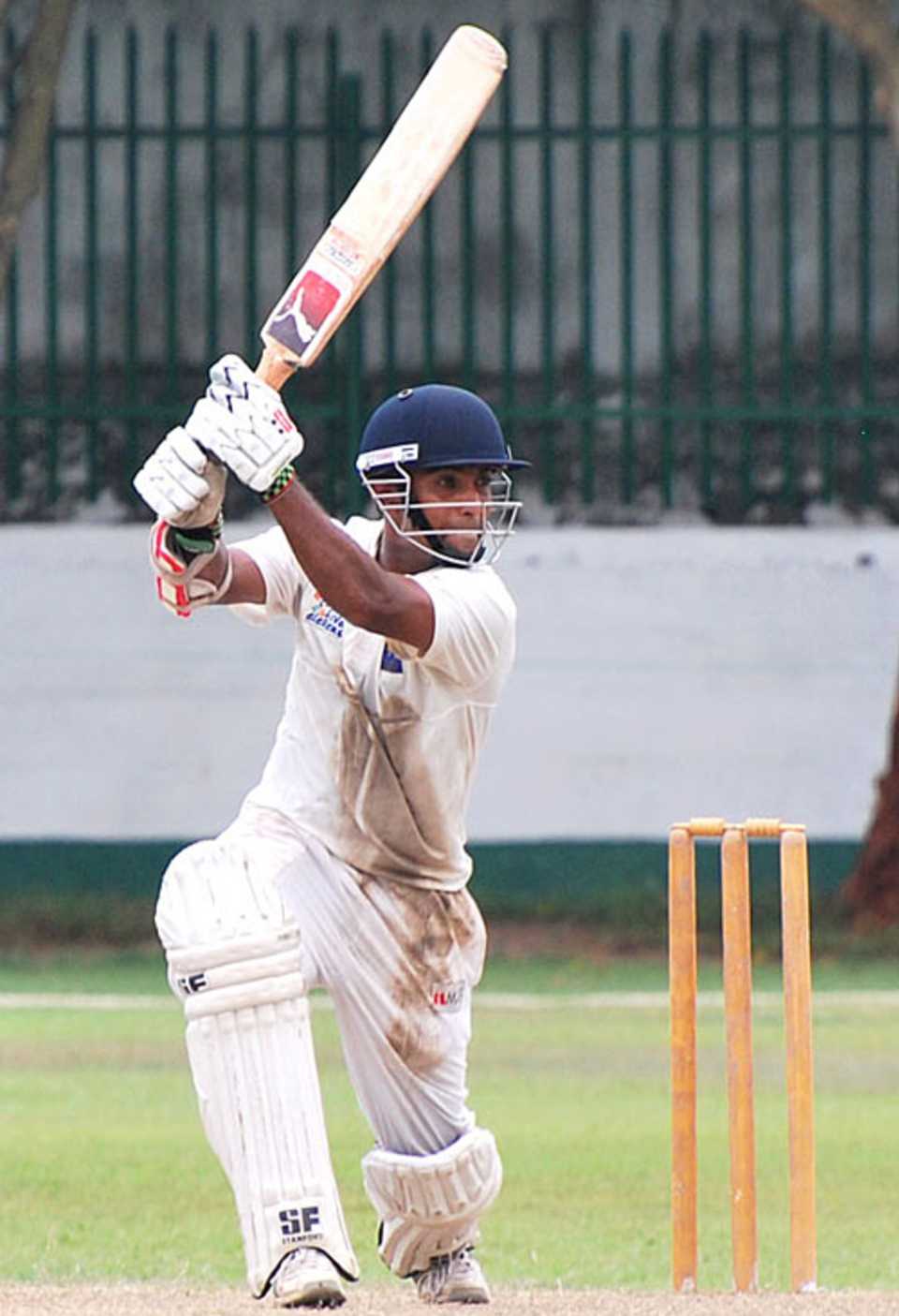 Geeth Alwis drives through the off side during his century