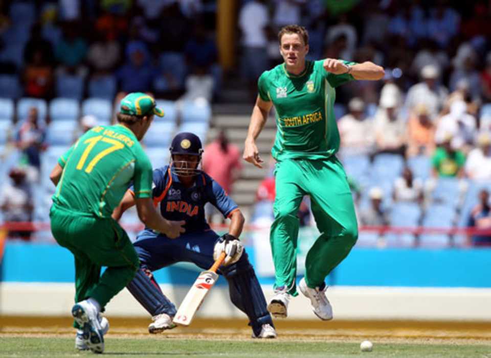 AB de Villiers swoops in to field the ball as Morne Morkel and Suresh Raina look on, South Africa v India, World Twenty20, Beausejour, Gros Islet, St Lucia May 2, 2010 
