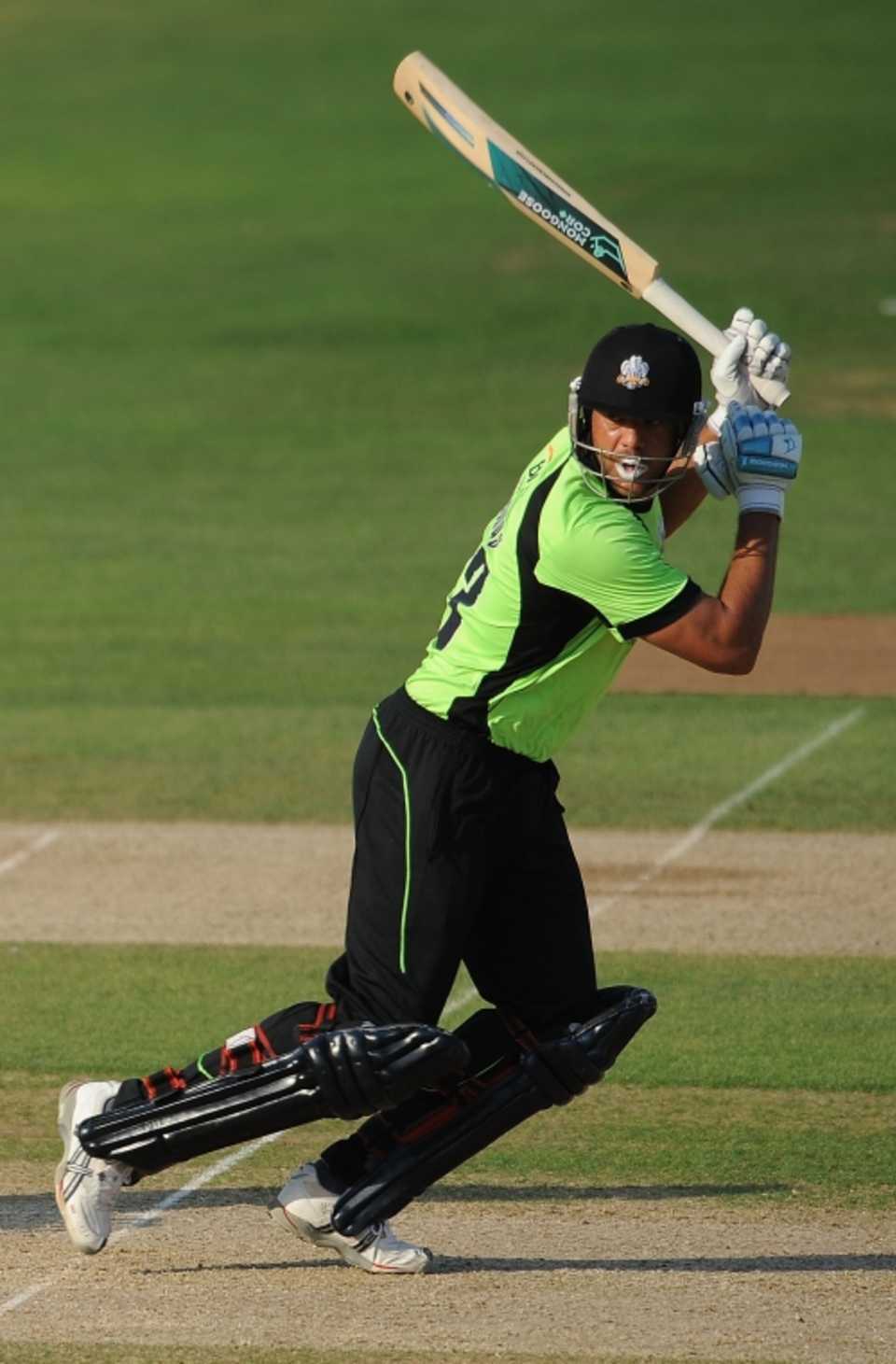Andrew Symonds top-scored with 63 from 33 balls to set up an 11-run win for Surrey