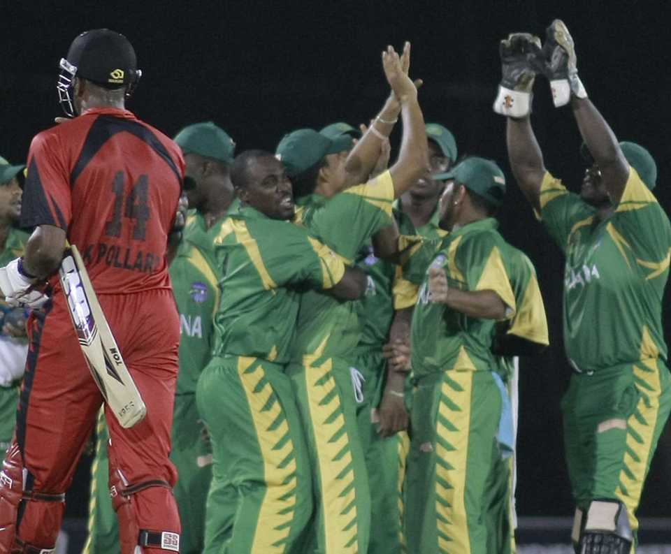 Guyana celebrate the key wicket of Kieron Pollard
