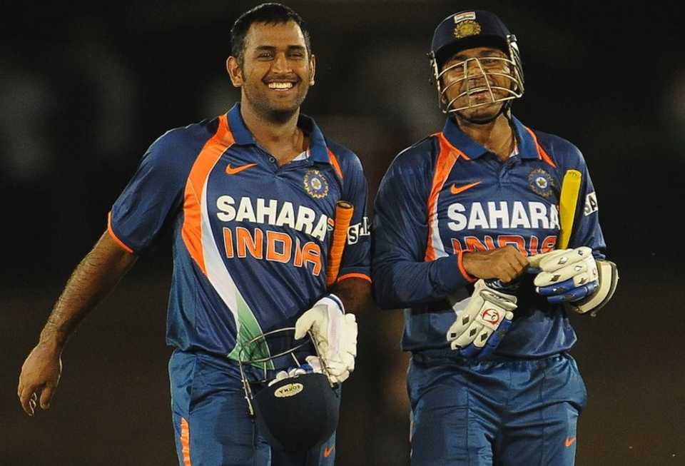 MS Dhoni and Virender Sehwag walk off after securing the bonus point, Sri Lanka v India, tri-series, 3rd ODI, Dambulla, August 16, 2010