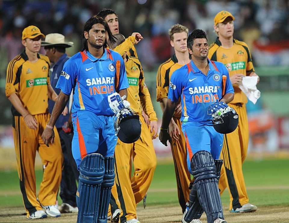 Saurabh Tiwary and Suresh Raina walk off after securing India's win, India v Australia, 2nd ODI, Visakhapatnam, October 20, 2010
