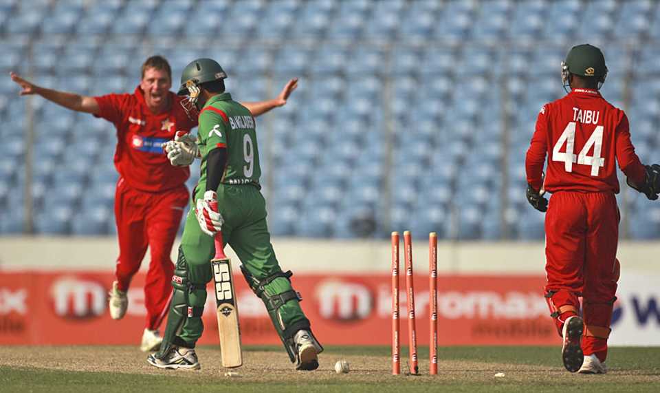 Ray Price celebrate after bowling Mushfiqur Rahim for 1, Bangladesh v Zimbabwe, 1st ODI, Mirpur, December 1, 2010
