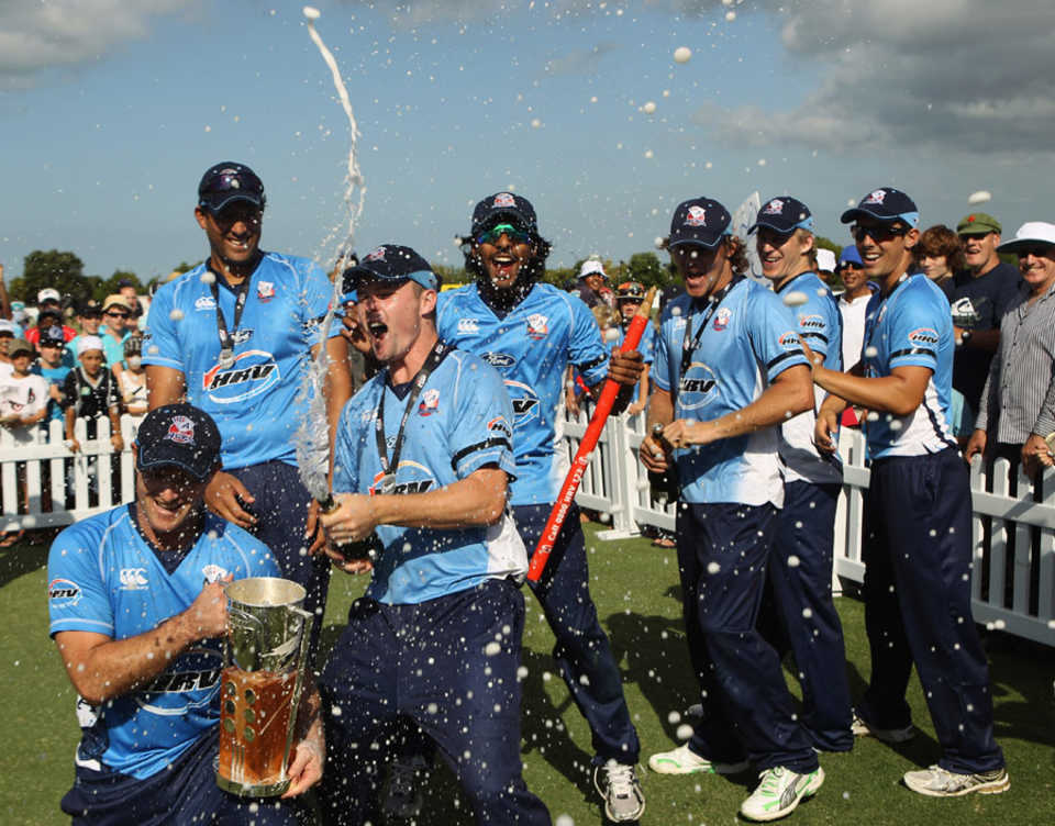 Auckland pop open the champagne after taking the title
