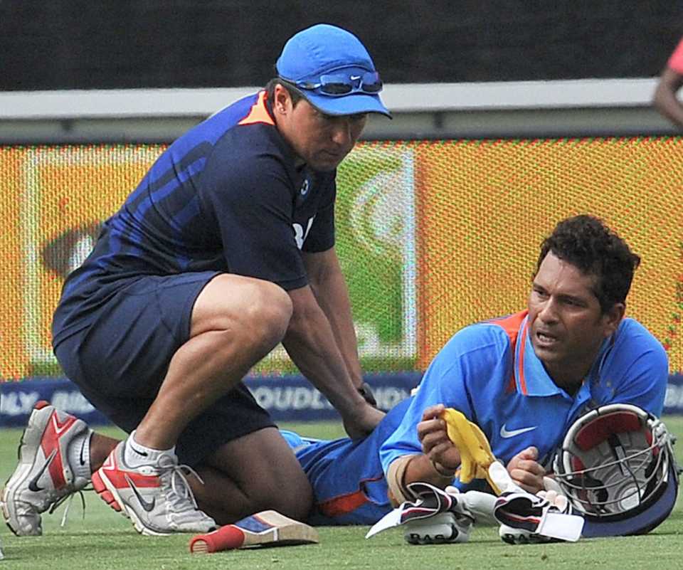 Sachin Tendulkar gets some treatment from the support staff