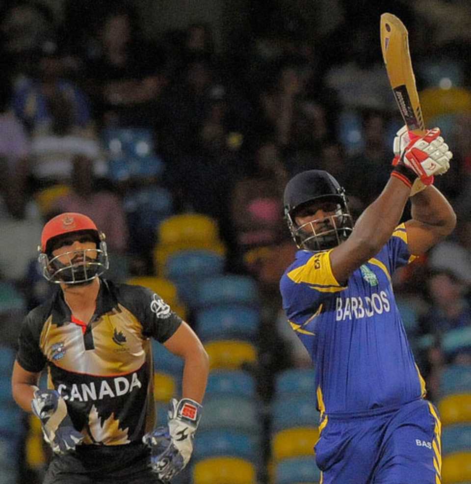 Dwayne Smith smashes one down the ground, Barbados v Canada, Barbados, Caribbean T20, January 19, 2011 