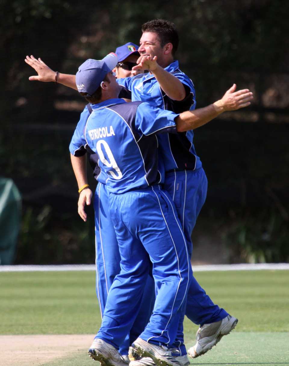 Vincenzo Pennazza is congratuled after taking a wicket