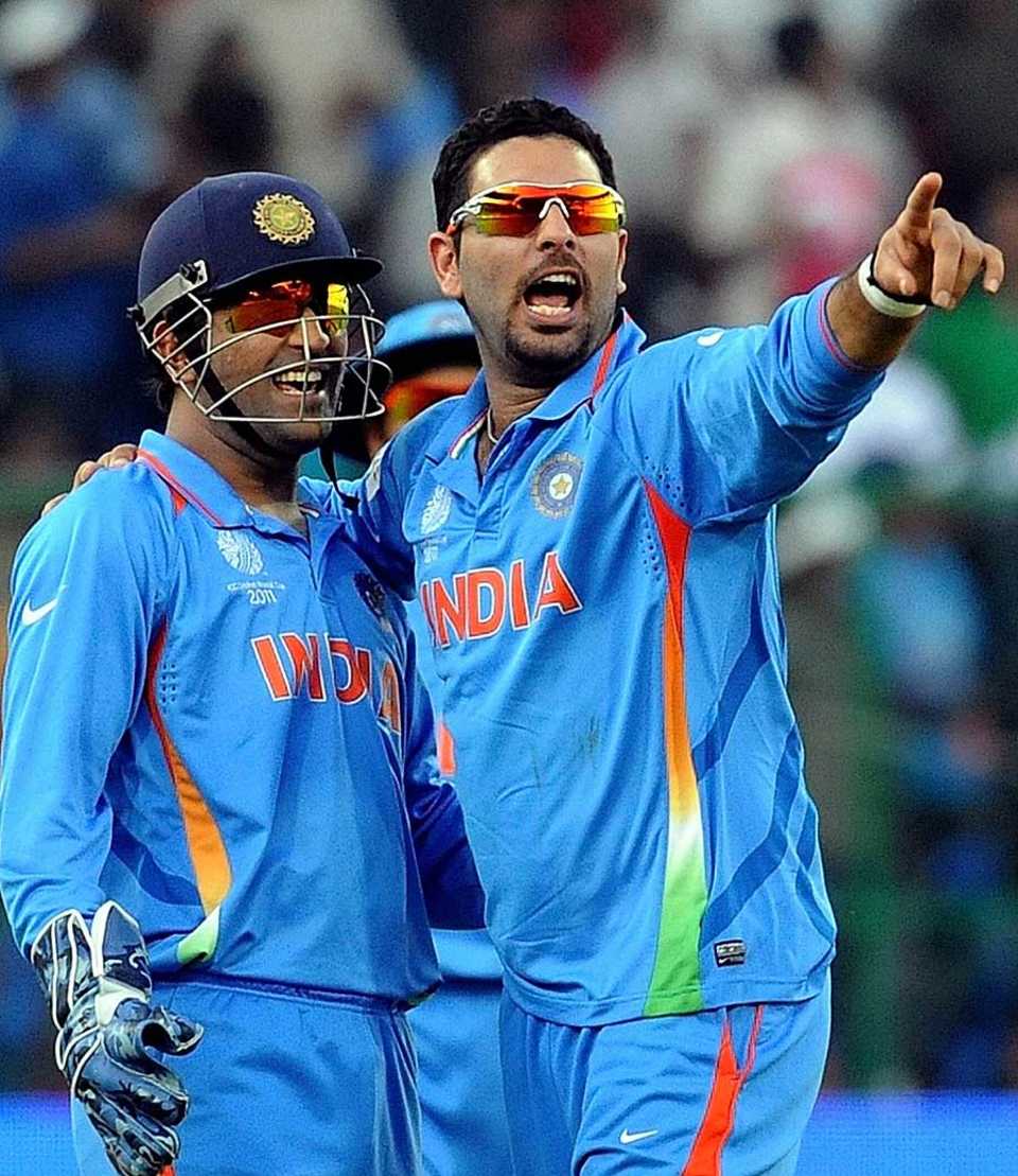 Yuvraj Singh celebrates his five-wicket haul with MS Dhoni | KreedOn