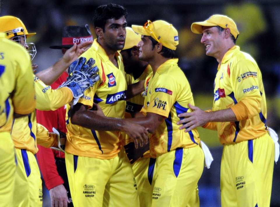 R Ashwin is congratulated by his team-mates after getting Jesse Ryder