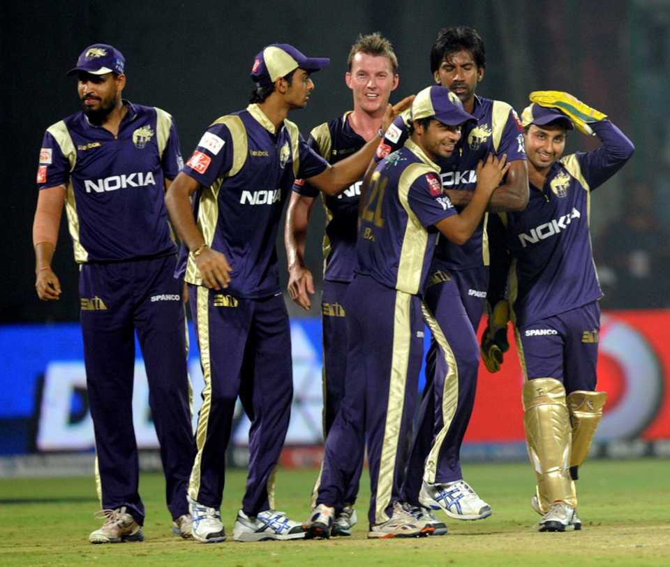Kolkata's players walk off after their 17-run victory 