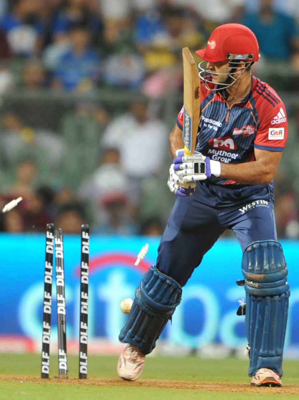 Irfan Pathan's stumps get in the way of a Lasith Malinga yorker