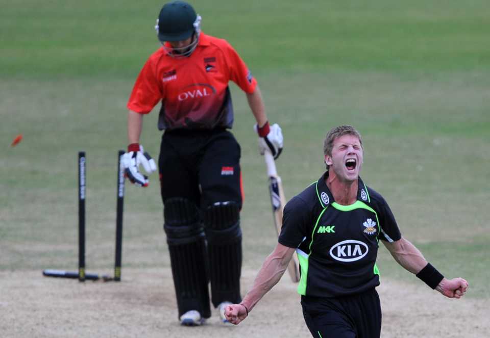 Stuart Meaker celebrates the wicket that sealed Surrey's victory